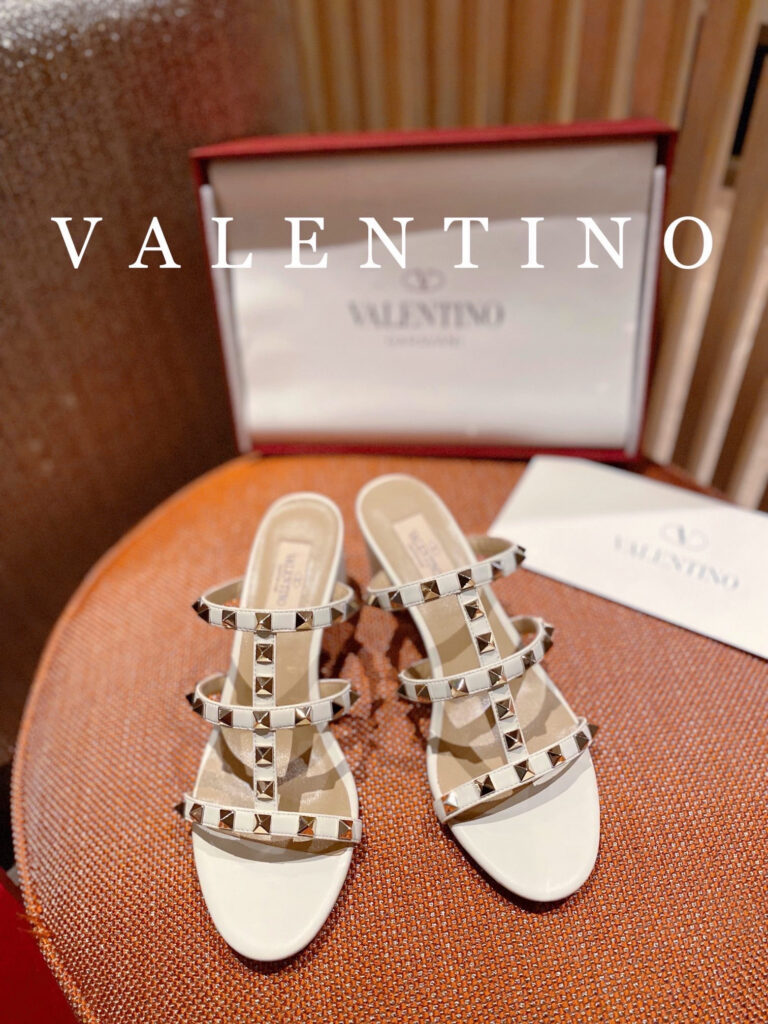 Valentino Rockstud Slide Sandal Calfskin Leather Sandals editorial product context 1