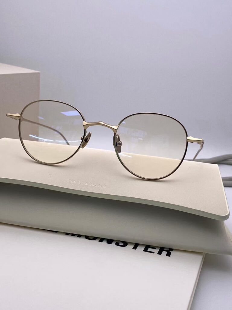 Gentle Monster Eyeglasses Metal Gold Ring editorial product context 2