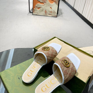 Gucci gg matelassé canvas slide sandal