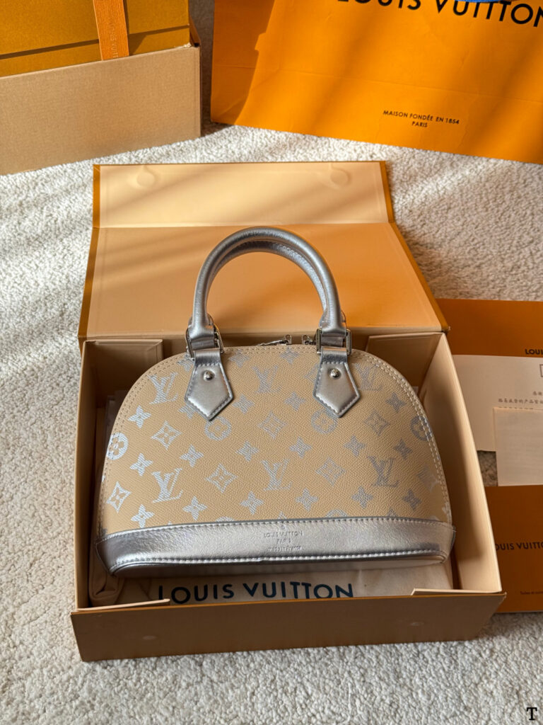 Louis Vuitton Alma Bb Retiro Gold Calfskin Leather Handbag 18 cm editorial product context 2