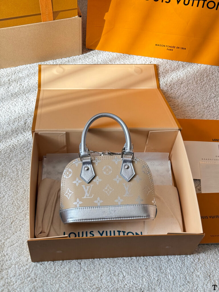 Louis Vuitton Alma Bb Retiro Gold Calfskin Leather Handbag 18 cm editorial product context 3