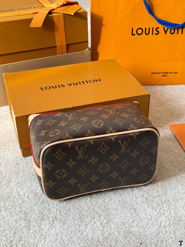 Louis Vuitton Monogram Cosmetic Case Gold Leather Handbag editorial product context 3