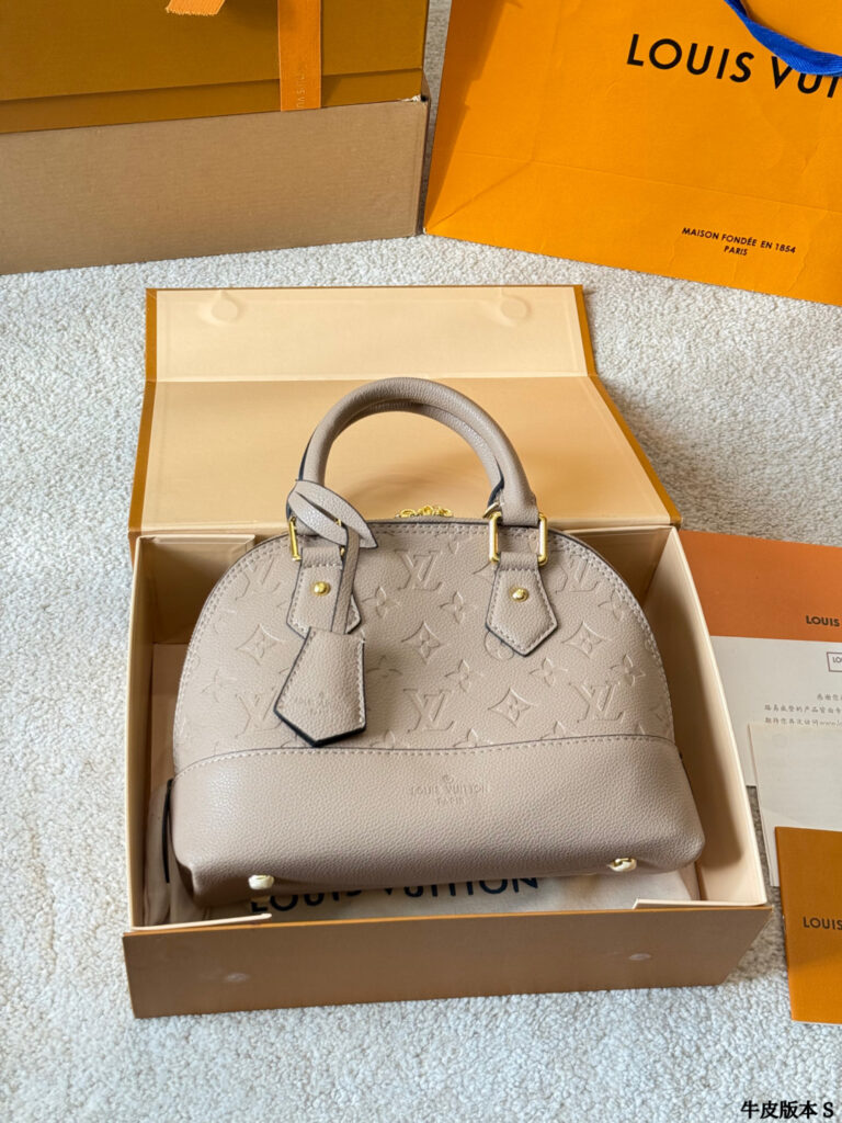 Louis Vuitton Montaigne Gold Leather Handbag editorial product context 2