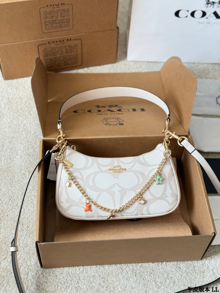 Coach Gold Leather Shoulder Bag editorial product context 3