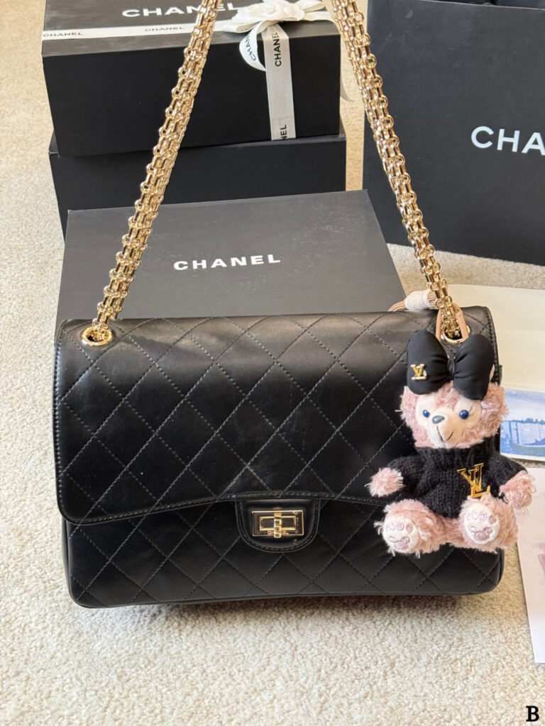 Chanel Reissue 55 Gold Leather Shoulder Bag editorial product context 1