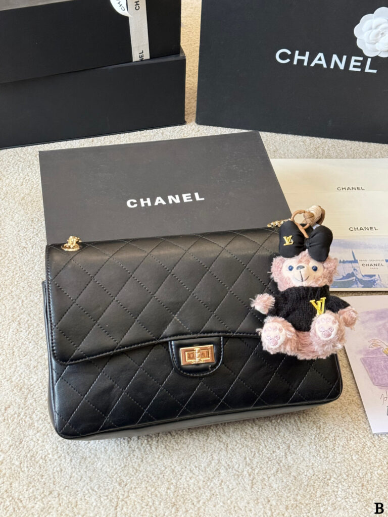 Chanel Reissue 55 Gold Leather Shoulder Bag editorial product context 2