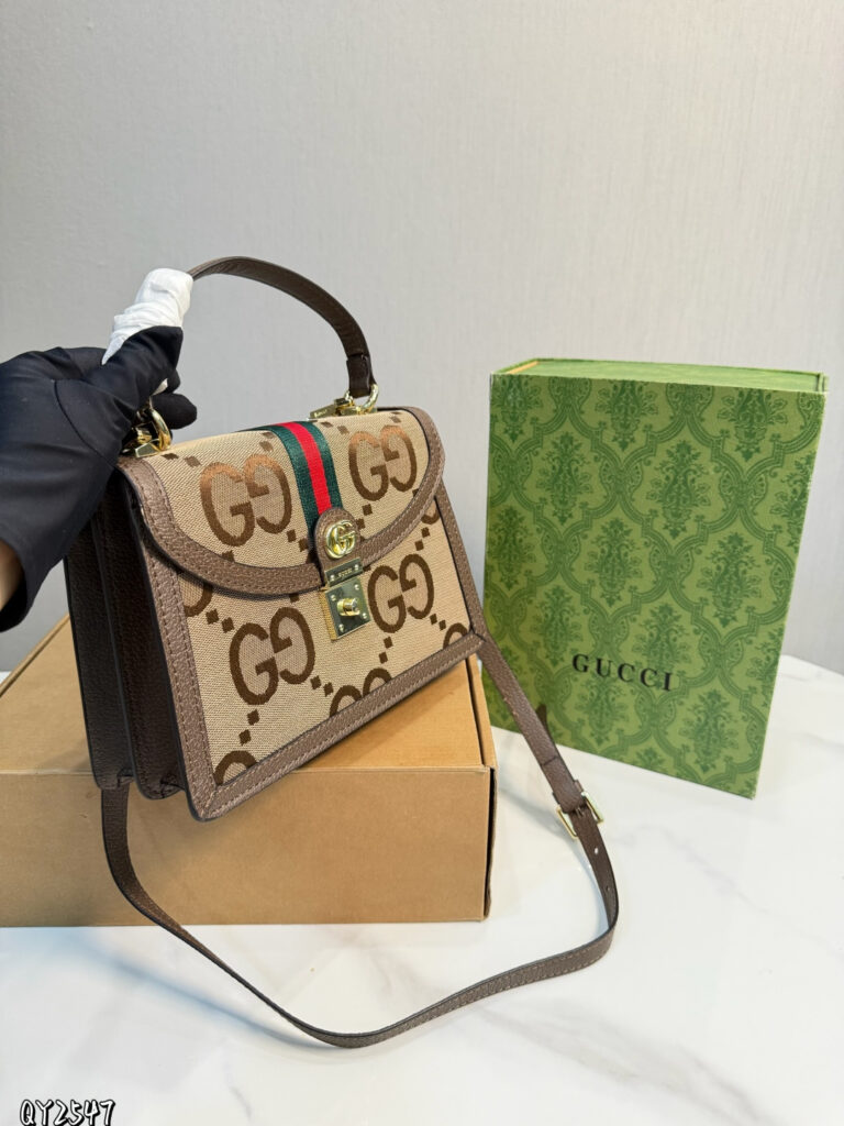 Gucci p125 Ophidia IN 25 Clutch 1.9 x 1.1 x editorial product context 2