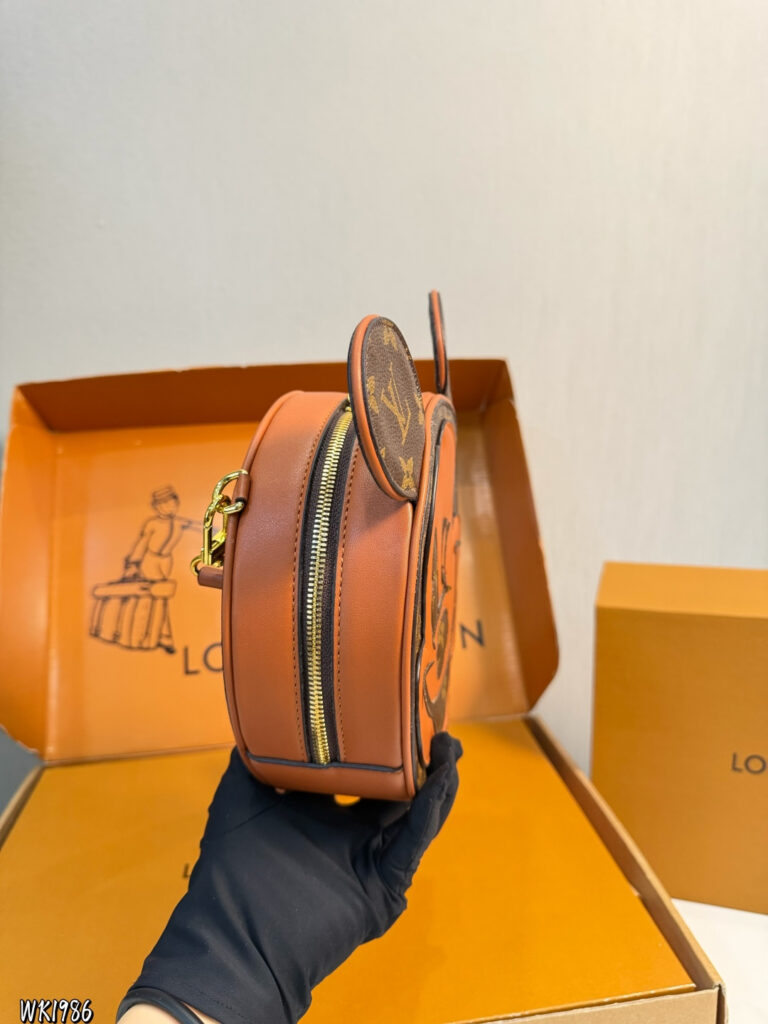 Louis Vuitton p125 logo 23 Clutch 1.9 x 1.1 x editorial product context 3