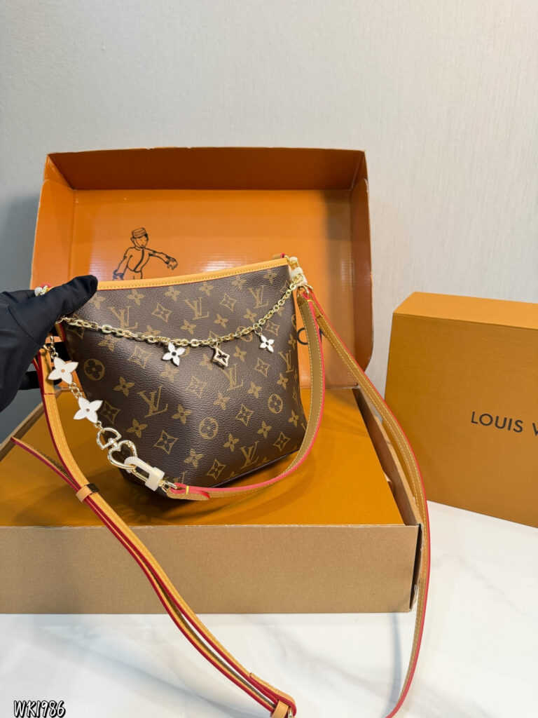 Louis Vuitton p140 17 Bucket Clutch 1.9 x 1.1 x editorial product context 2