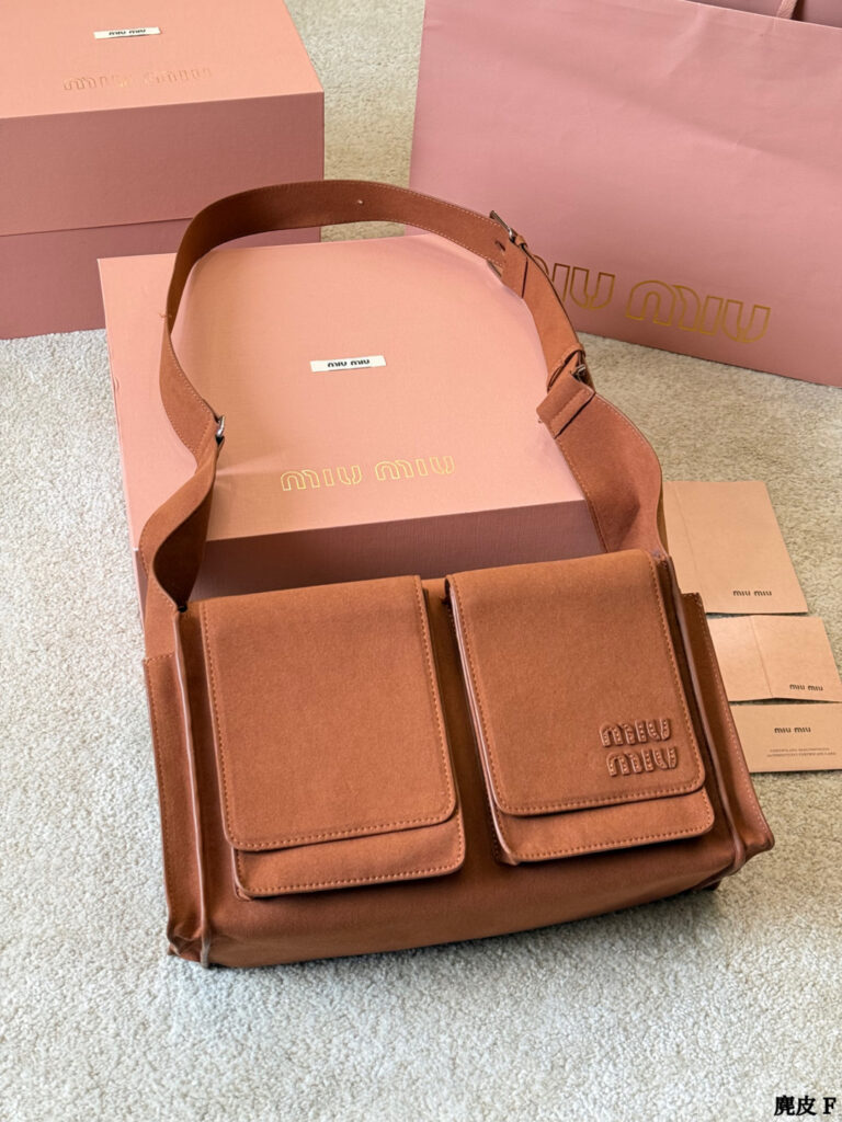 Miu Miu p205 2026 OK 35 Clutch 1.9 x 1.1 editorial product context 1