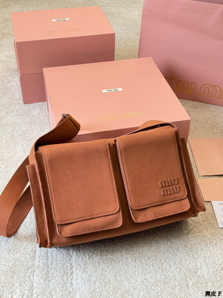 Miu Miu p205 2026 OK 35 Clutch 1.9 x 1.1 editorial product context 3
