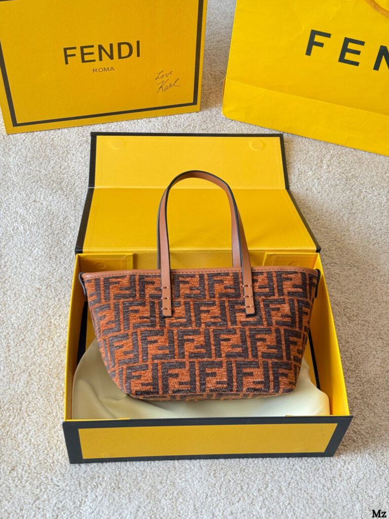 Fendi Roll 18 Mini Black Calfskin Leather Clutch editorial product context 3