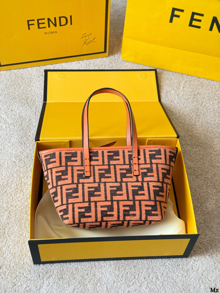 Fendi Roll 18 Mini Black Calfskin Leather Clutch editorial product context 2