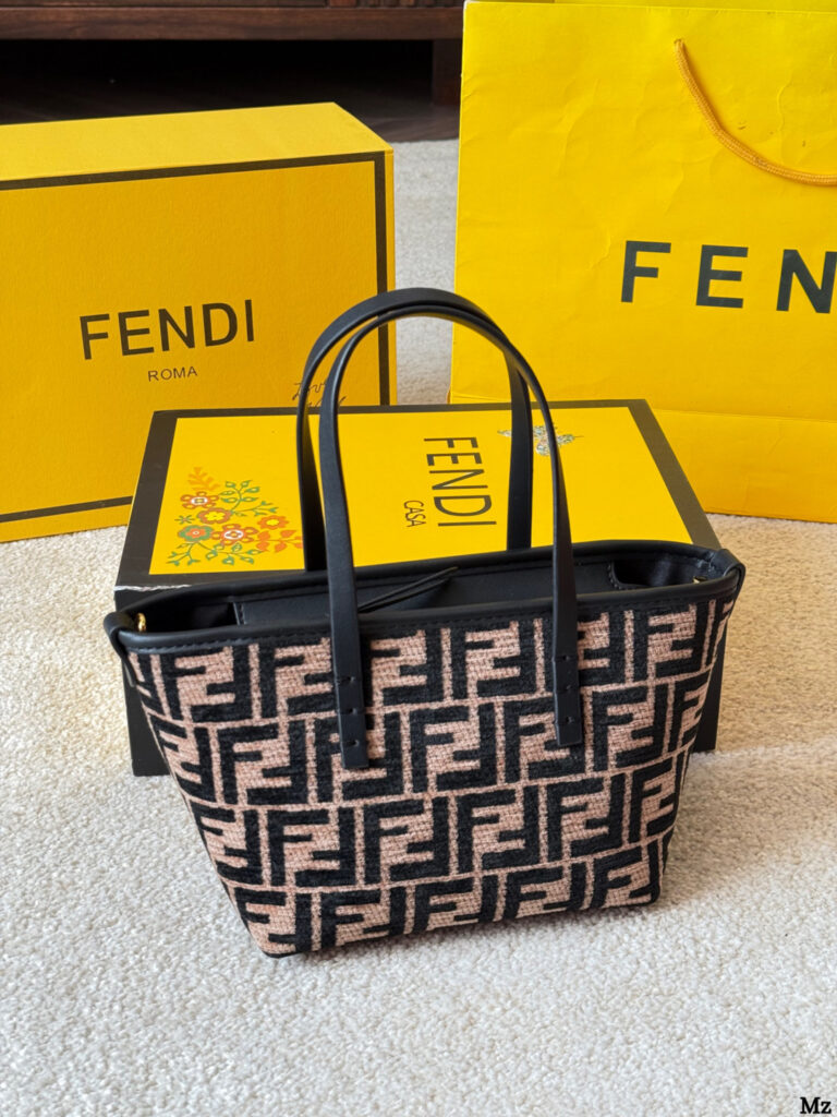 Fendi Roll 18 Mini Black Calfskin Leather Clutch editorial product context 3