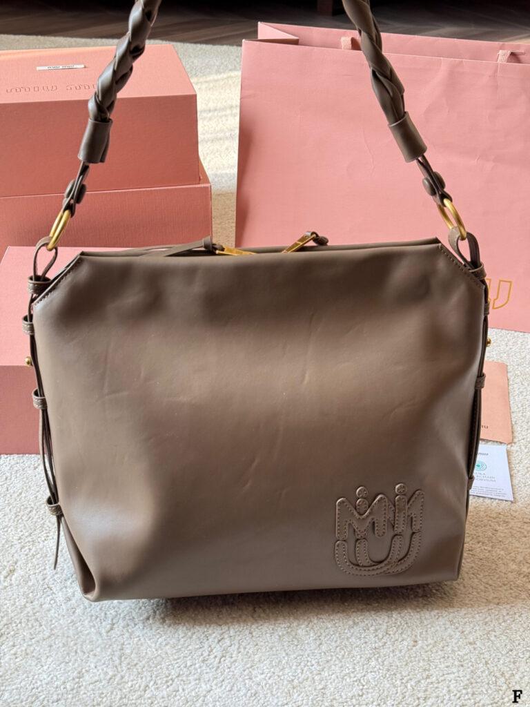 Miu Miu p170 MIV Logo 30 Clutch 1.9 x 1.1 editorial product context 3