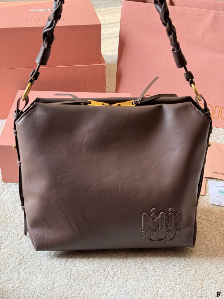 Miu Miu p170 MIV Logo 30 Clutch 1.9 x 1.1 editorial product context 1