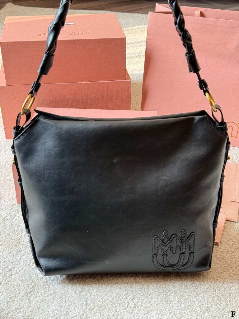 Miu Miu p170 MIV Logo 30 Clutch 1.9 x 1.1 editorial product context 2