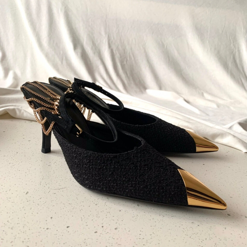 Saint Laurent chain pumps editorial product context 1
