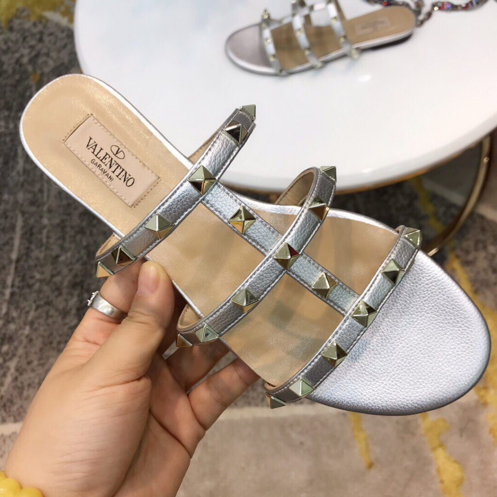 Valentino Rockstud Slide Sandal Calfskin Leather Sandals editorial product context 1