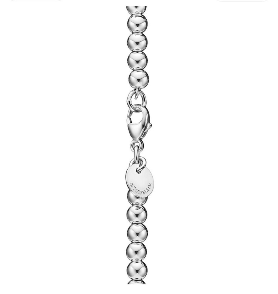 Designer L100 logo Ring editorial product context 3