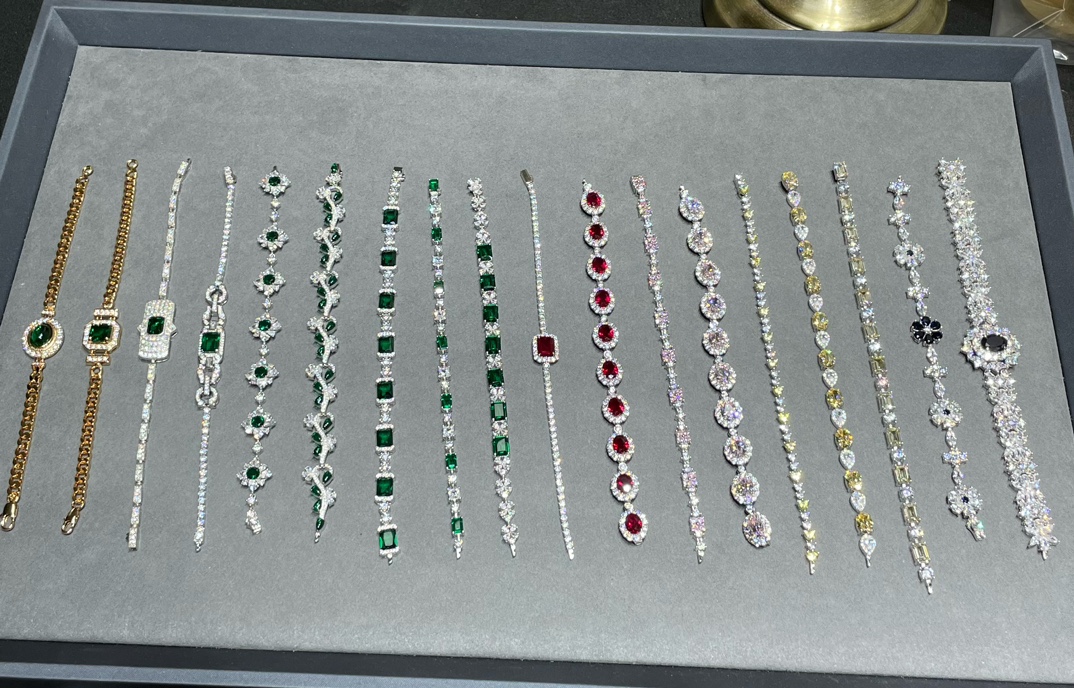 Designer Unknown curated collection OF bracelets featuring