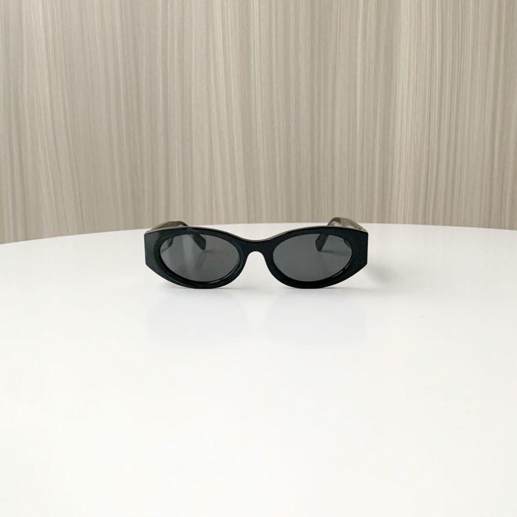 Miu Miu Sunglasses Black Piece editorial product context 3
