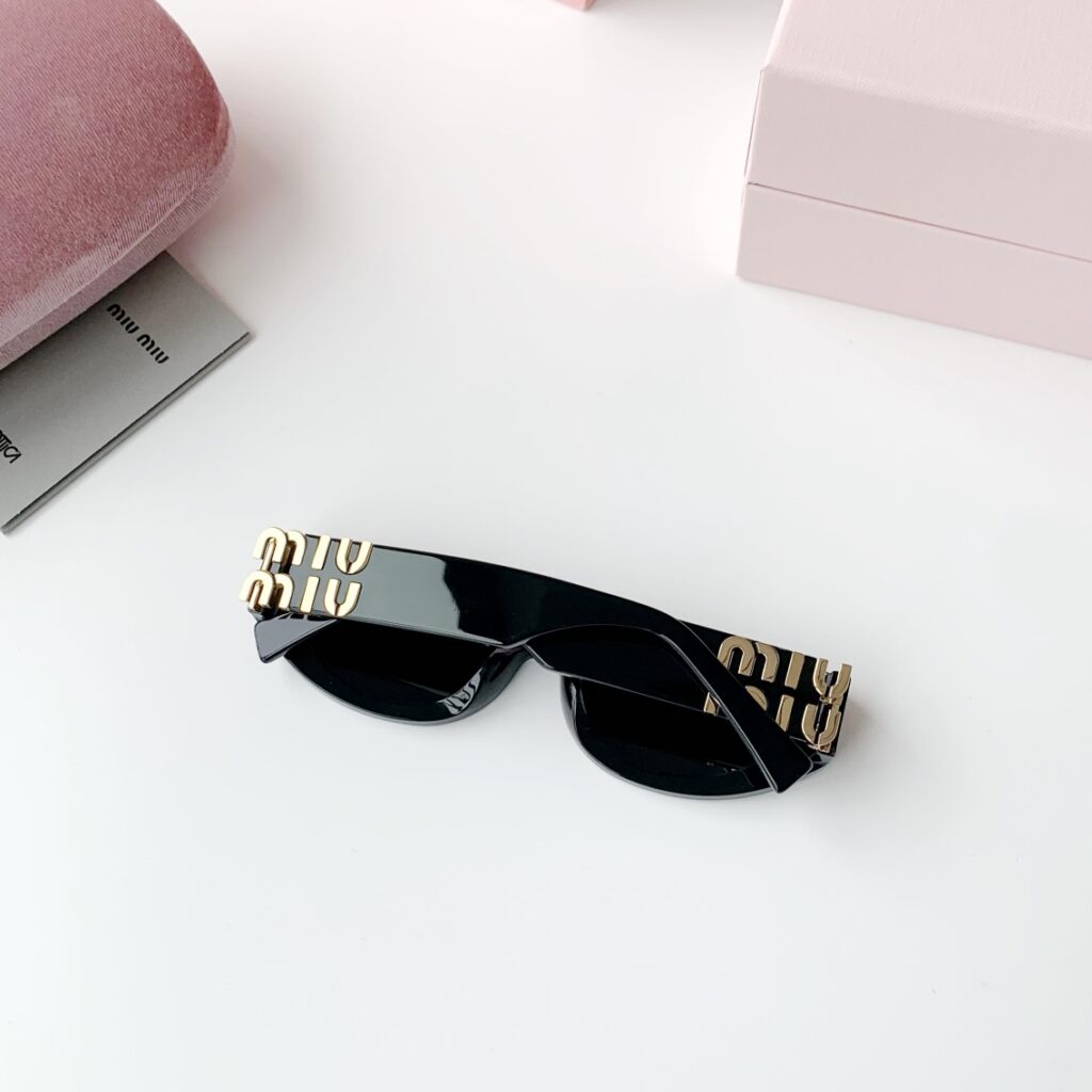Miu Miu Sunglasses Black Piece editorial product context 2