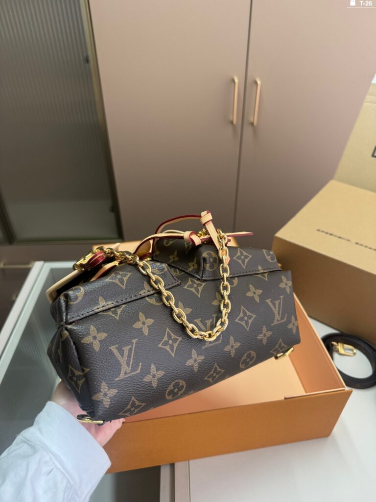 Louis Vuitton Duma Bb Small Black Calfskin Leather Clutch editorial product context 3