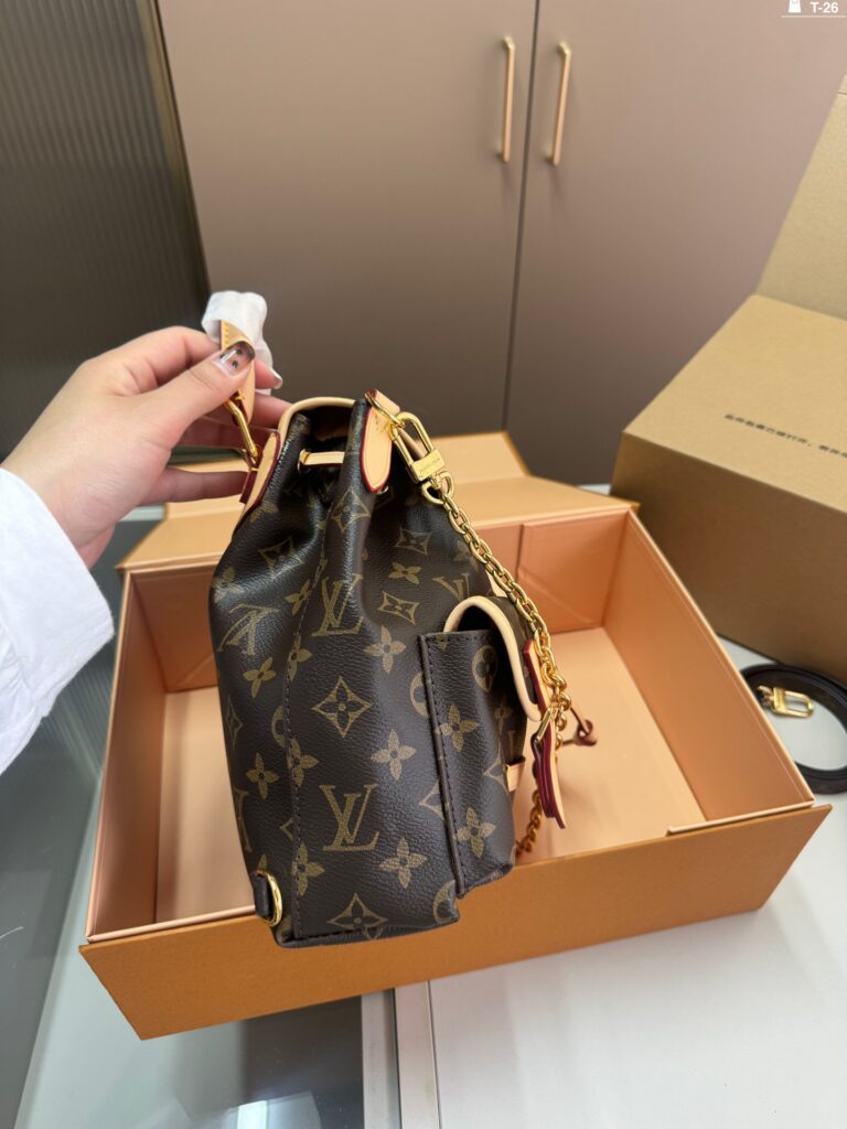 Louis Vuitton Duma Bb Small Black Calfskin Leather Clutch editorial product context 2