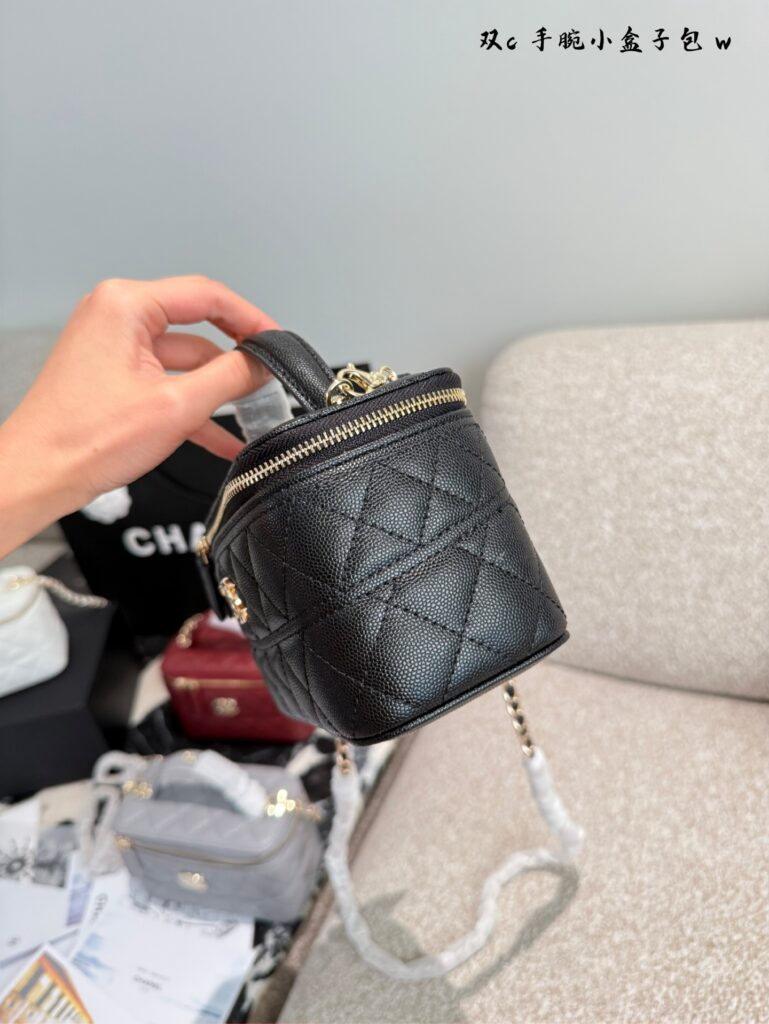 Chanel Logo .5 Gold Leather Bag 9 x 8 cm editorial product context 2