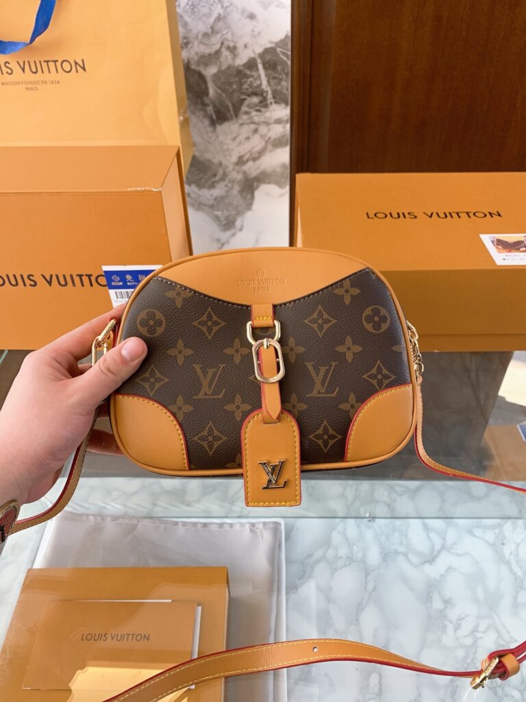 Louis Vuitton Deauvle Mini Crossbody Bag editorial product context 2