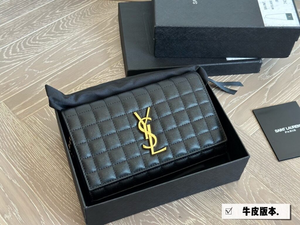 Saint Laurent Cassandre Leather Clutch 23 x 13 cm editorial product context 2