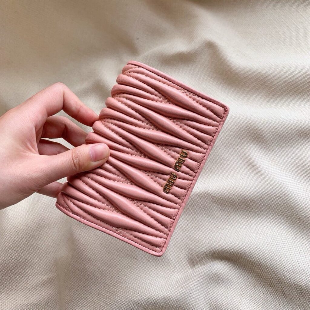 Miu Miu 13 Black Leather Wallet editorial product context 2