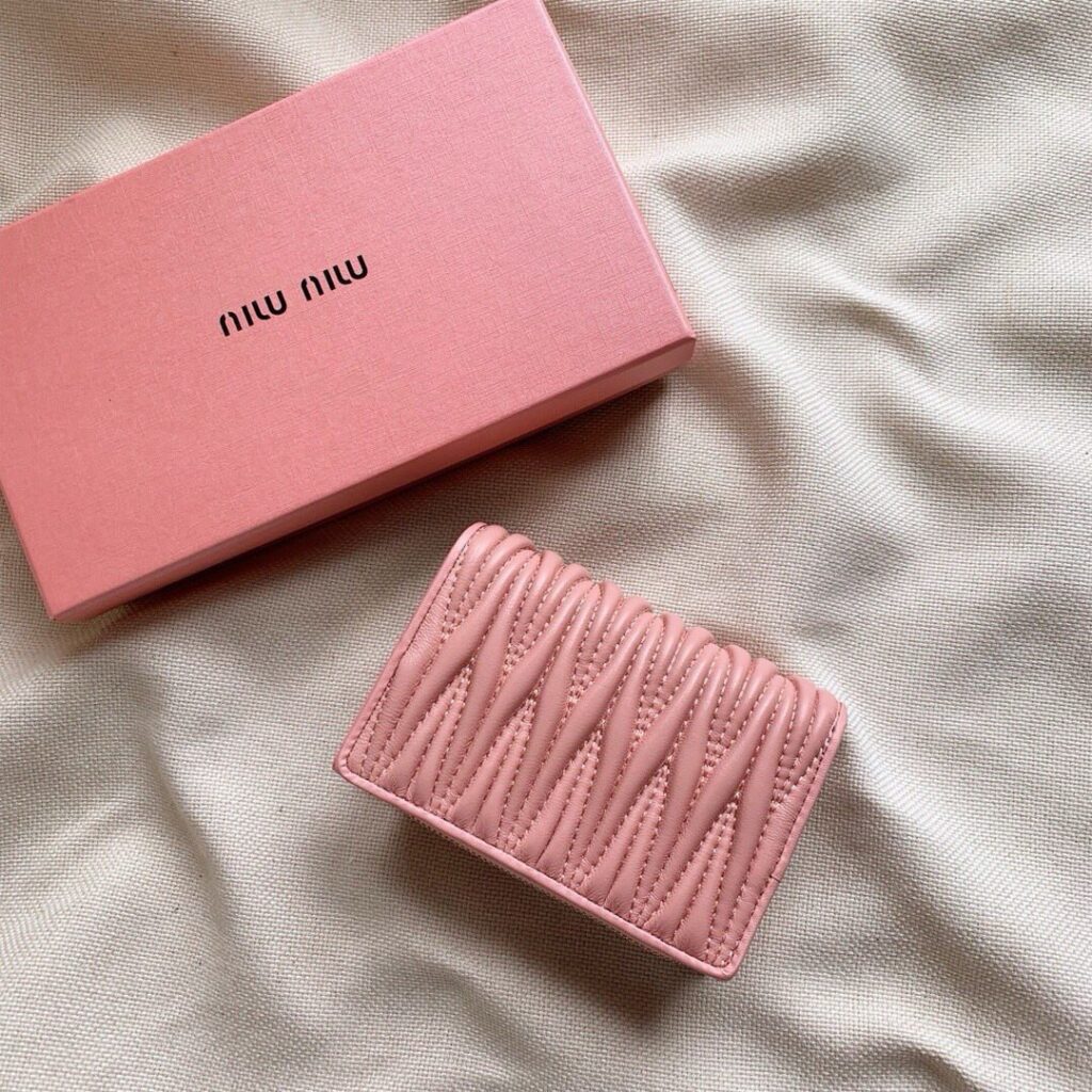 Miu Miu 13 Black Leather Wallet editorial product context 3
