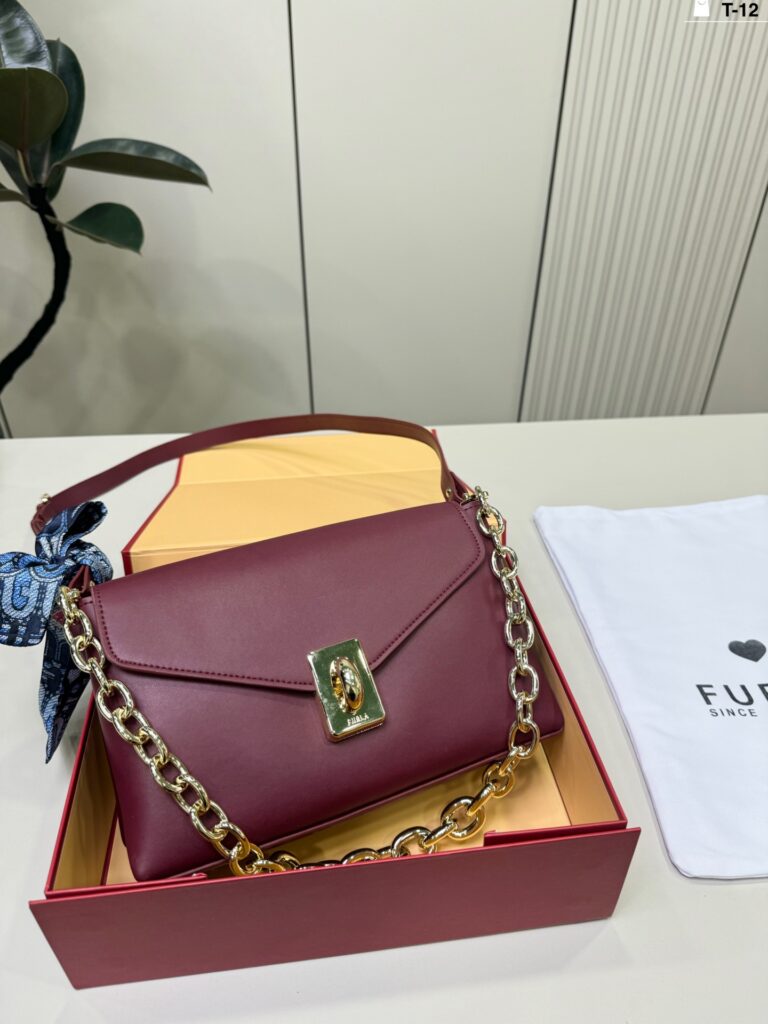 Designer Furla Meridiana Crossbody Bag editorial product context 1