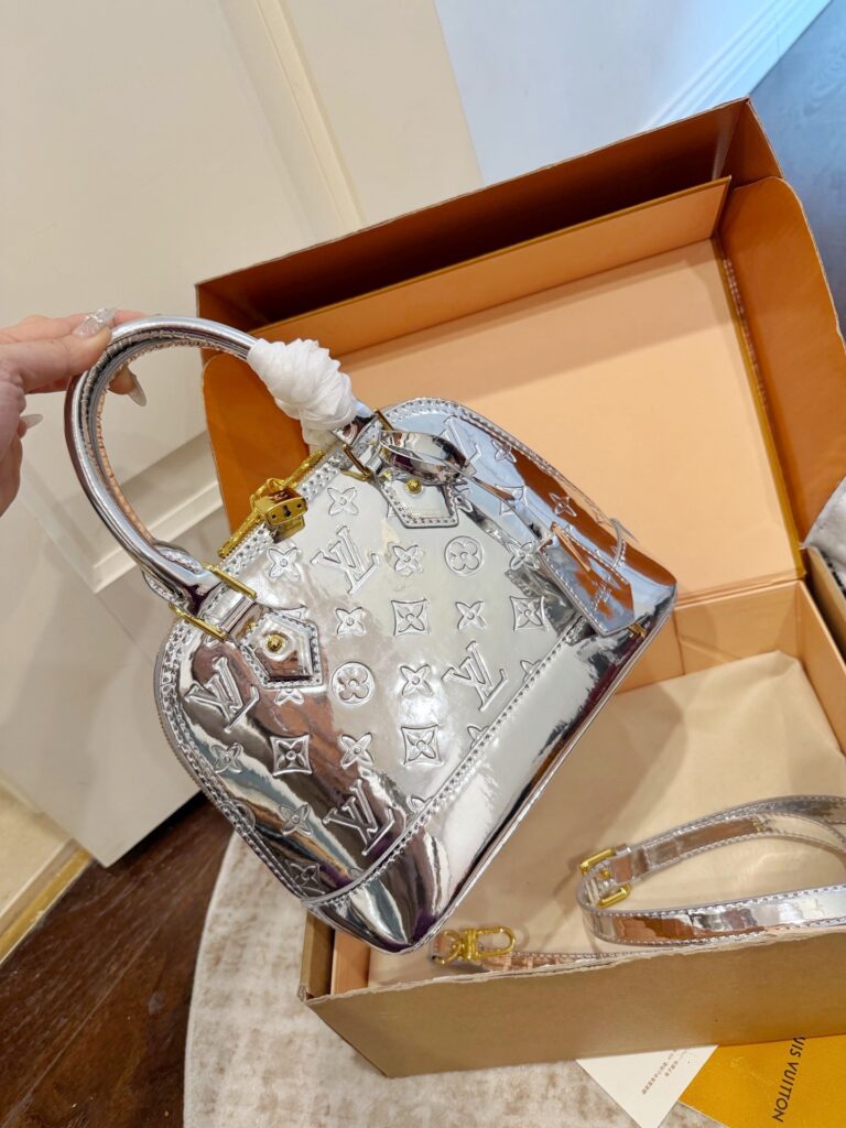 Louis Vuitton Alma Leather Bag 18 cm editorial product context 3
