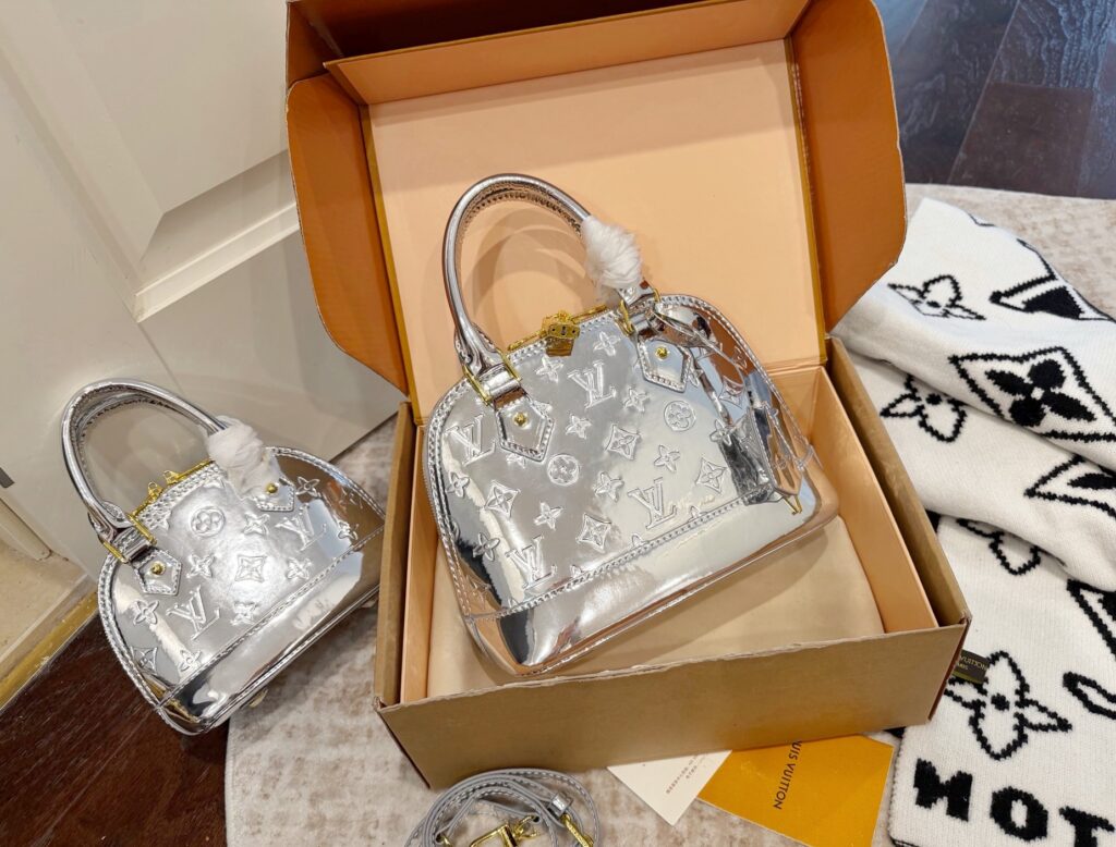 Louis Vuitton Alma Leather Bag 18 cm editorial product context 2