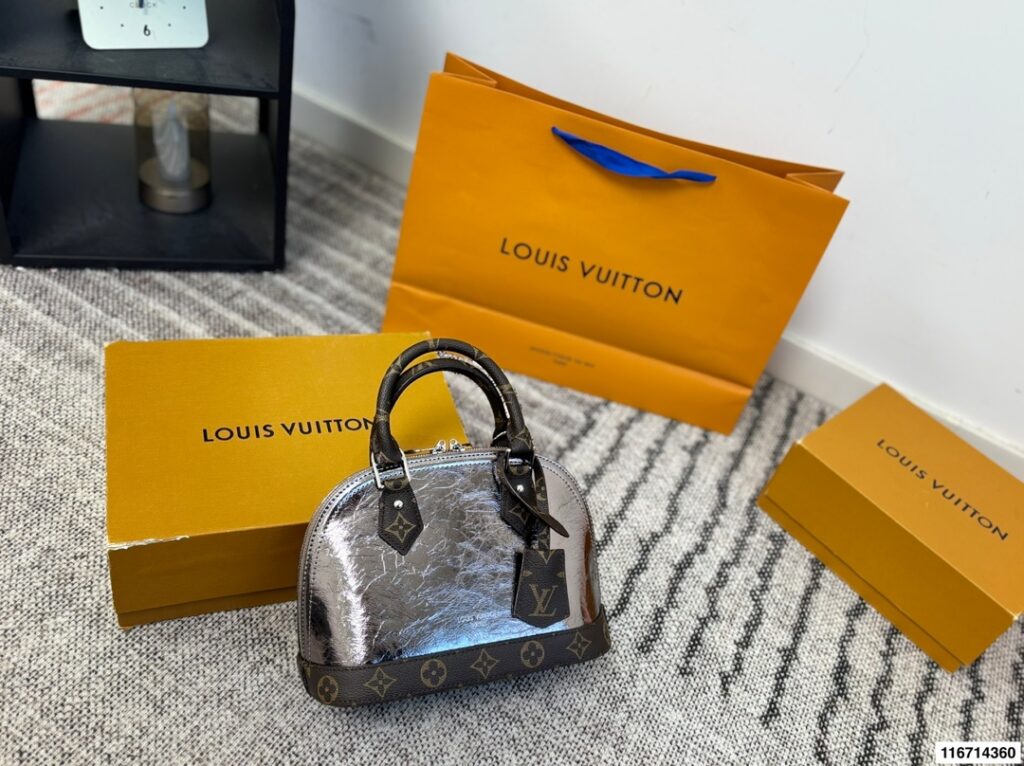 Louis Vuitton Alma Bb Leather Bag 25 x 17 cm editorial product context 2