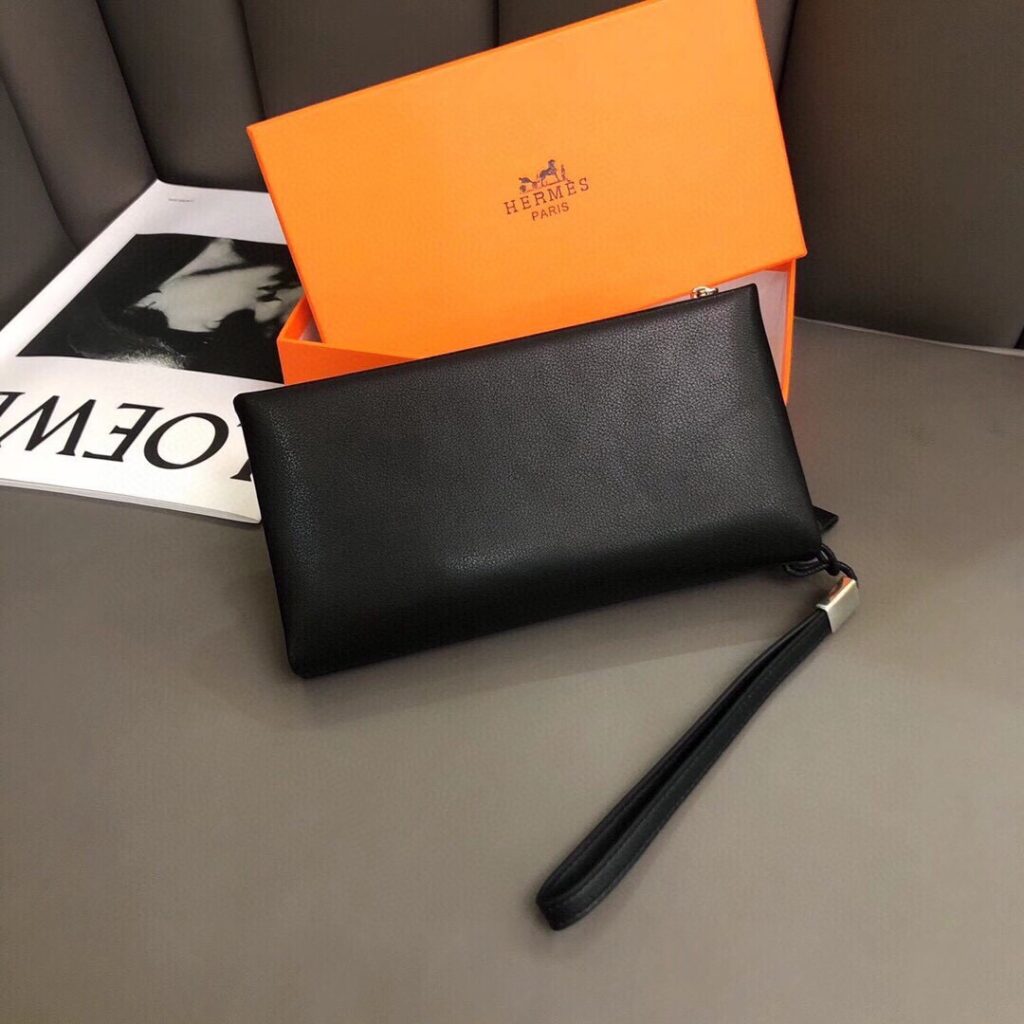Hermes Black Leather Clutch 21 x 10 cm editorial product context 2