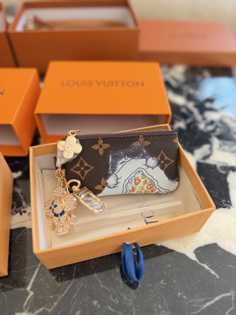 Louis Vuitton Small Gold Canvas Card Holder editorial product context 3