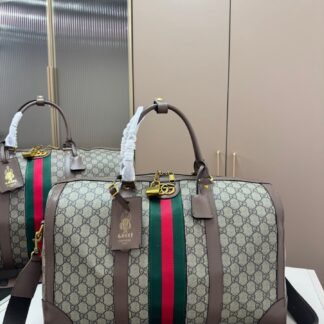 Gucci GG Marmont Leather Duffle THE offers luxurious AND stylish travel companion Crafted IN Italy from supple featuring iconic logo gold-tone hardware This structured silhouette IS perfect FOR carrying essentials style features TOP ZIP closure ideally suited GYM OR weekend getaways Highlights Signature Made Materials color-gold material-leather material-metal Bag Bags