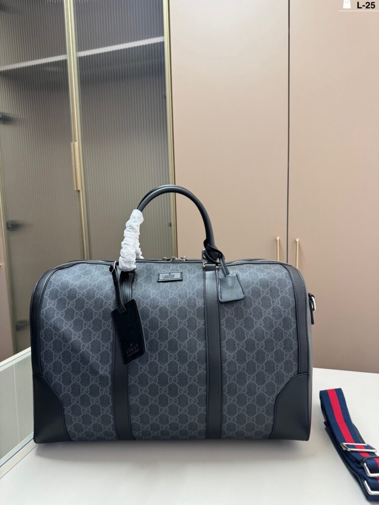 Gucci Gg Supreme Duffle Black Leather Bag editorial product context 1