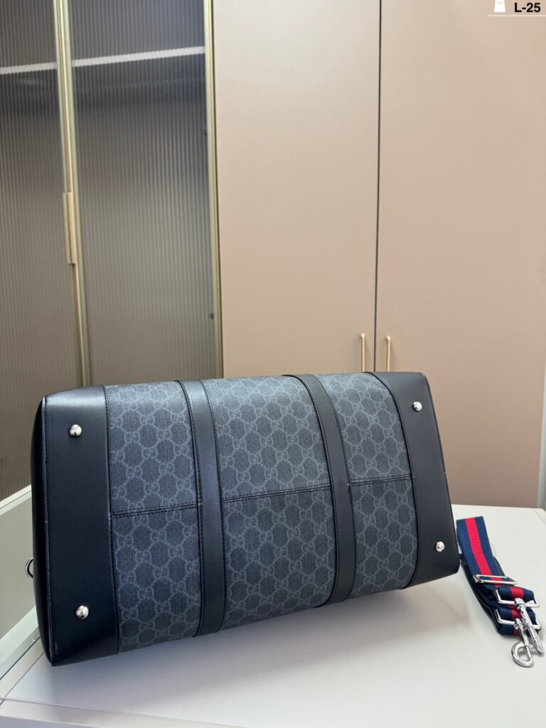 Gucci Gg Supreme Duffle Black Leather Bag editorial product context 3