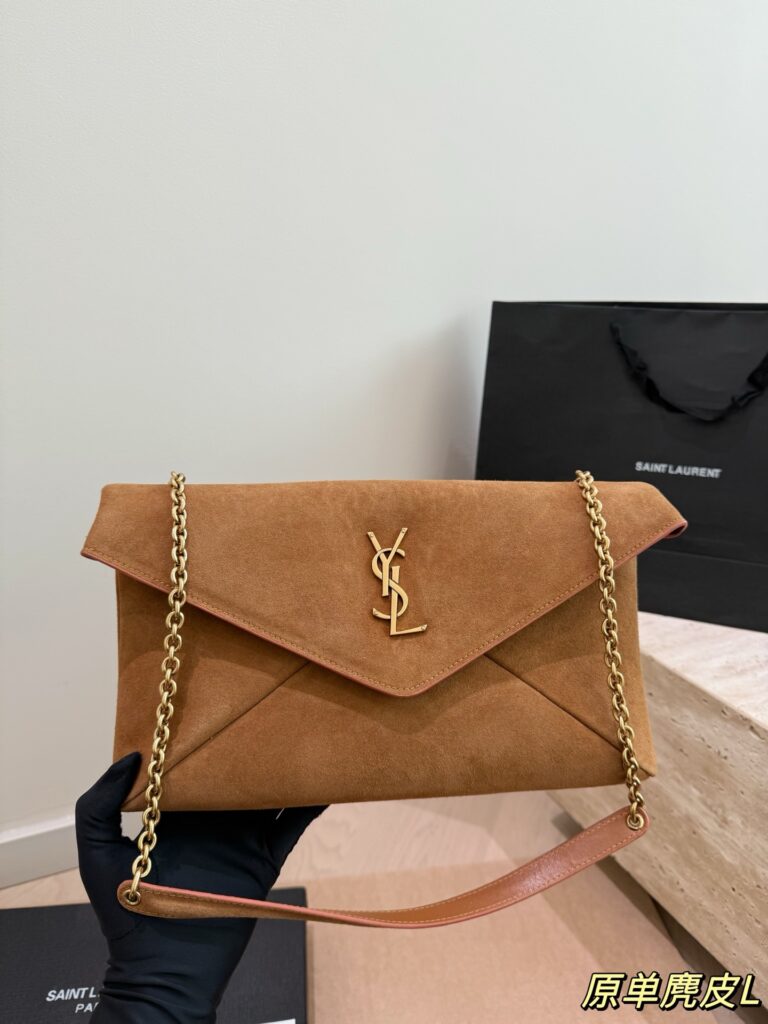 Saint Laurent Gold Suede Clutch editorial product context 1