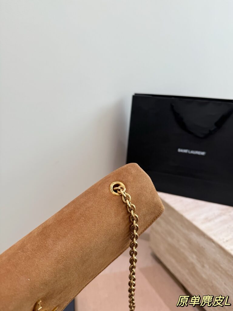 Saint Laurent Gold Suede Clutch editorial product context 2