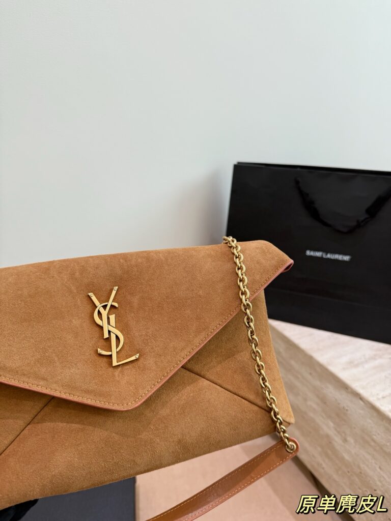 Saint Laurent Gold Suede Clutch editorial product context 3