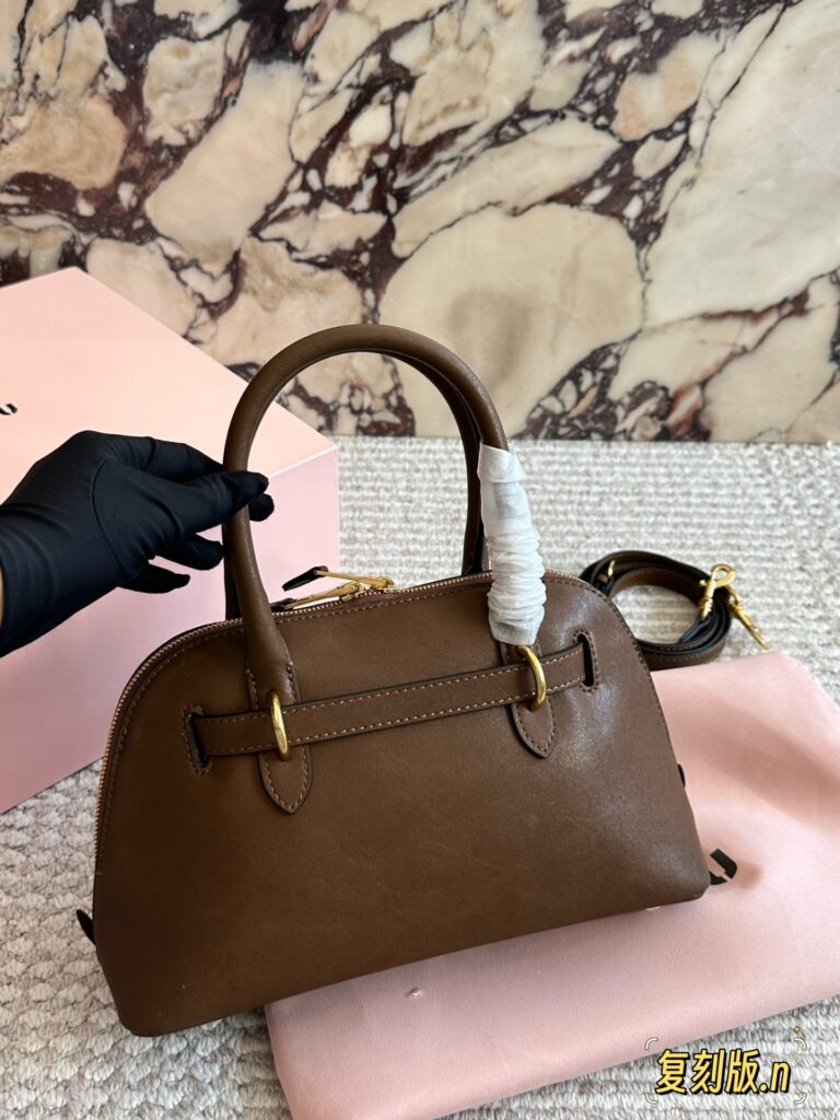 Hermes Lindy Gold Leather Handbag editorial product context 3