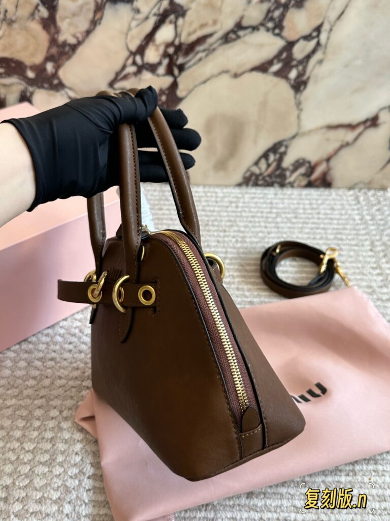 Hermes Lindy Gold Leather Handbag editorial product context 2