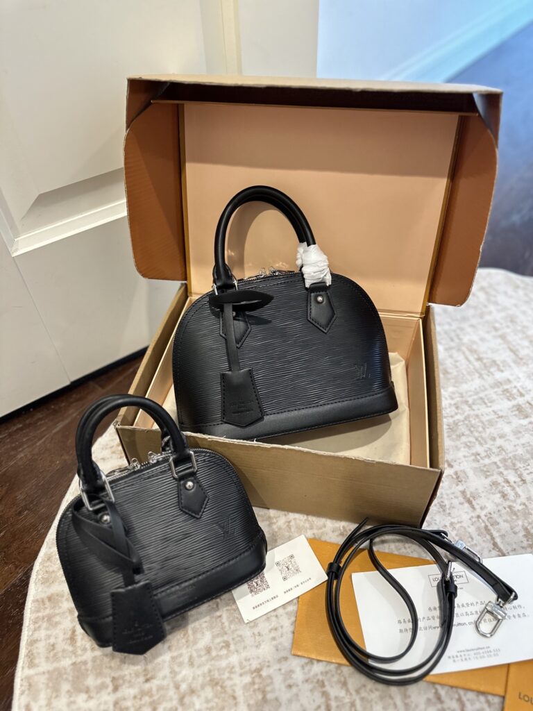 Louis Vuitton Alma Leather Handbag editorial product context 1