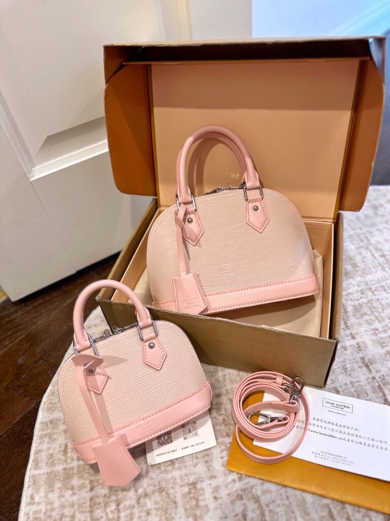 Louis Vuitton Alma Bb Pink Leather Handbag editorial product context 1